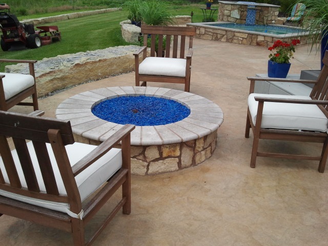 Outdoor fireplace and landscaping