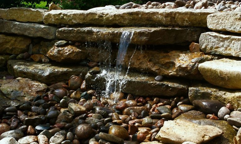 water splashing over stones